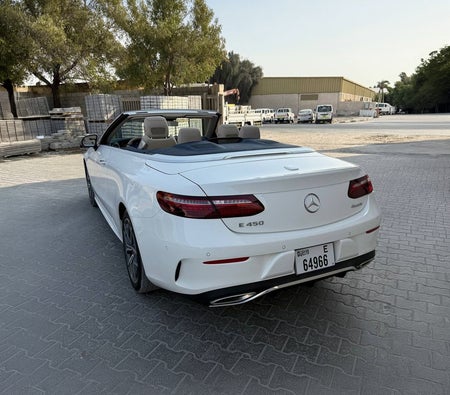White Mercedes Benz E450 2023