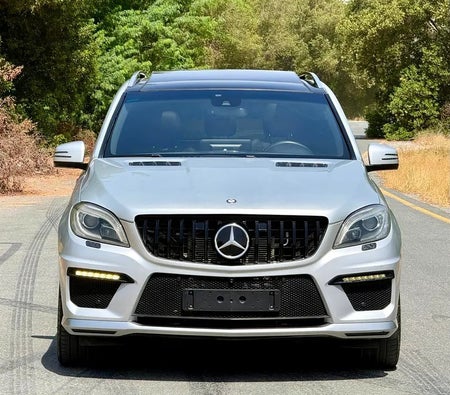 Silver Mercedes Benz ML 63 AMG 2015