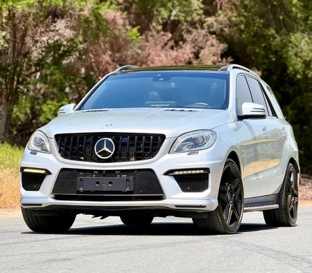 Silver Mercedes Benz ML 63 AMG 2015