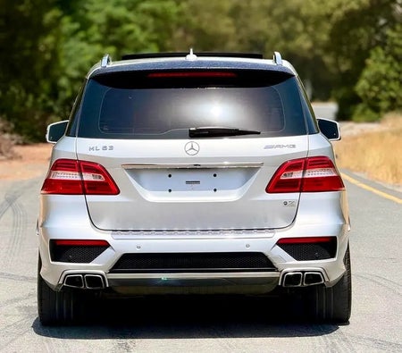 Silver Mercedes Benz ML 63 AMG 2015