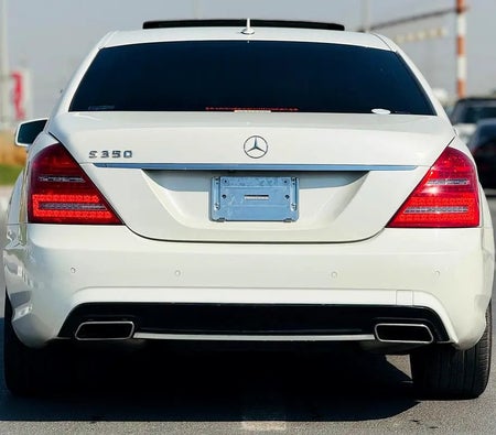 White Mercedes Benz S350 2012