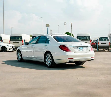 White Mercedes Benz S550 2014