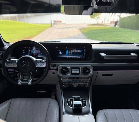 White Mercedes Benz AMG G63 2024