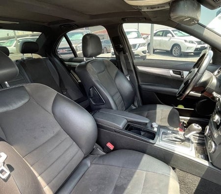 White Mercedes Benz C200 2014