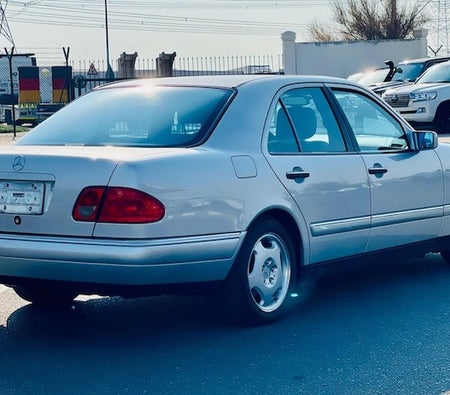 Silver Mercedes Benz E400 1997