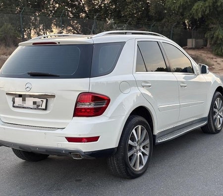 White Mercedes Benz ML ML 350 2011