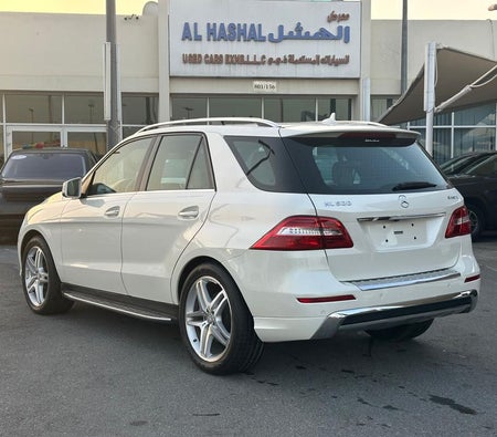White Mercedes Benz ML 500 2013