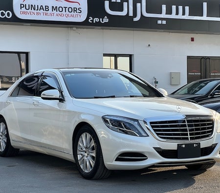 White Mercedes Benz S550 2015