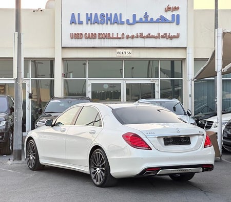 White Mercedes Benz S400 2015