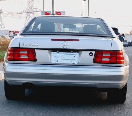 Silver Mercedes Benz SL 320 1998