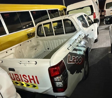 White Mitsubishi Pickup 2021