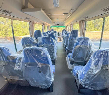 White Mitsubishi Rosa Bus 2024