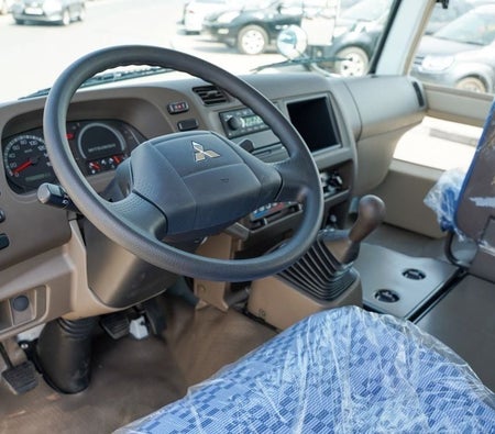 White Mitsubishi Rosa Bus 2026