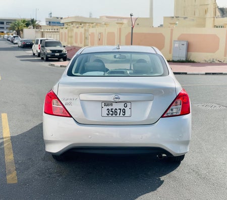 Silver Nissan Sunny 2024