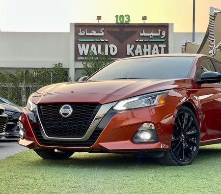 Orange Nissan Altima SR 2021