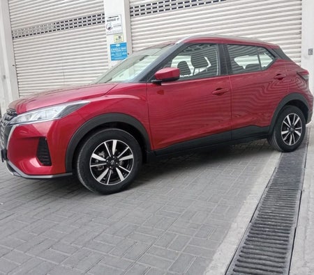 Burgundy Nissan Kicks 2024