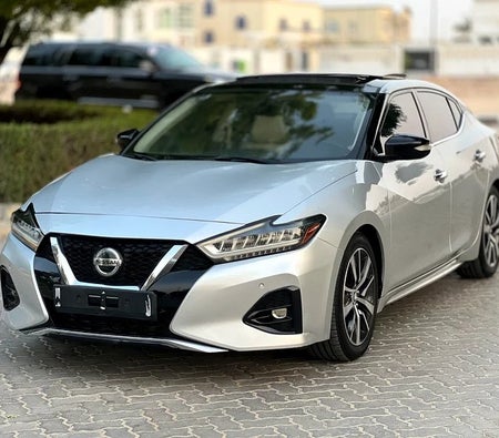 Silver Nissan Maxima SV 2019