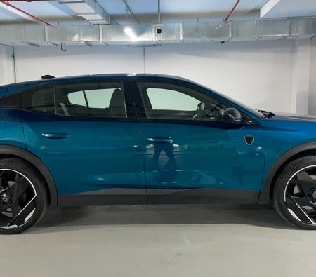Blue Peugeot 408 GT 2025