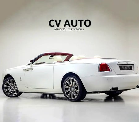 Белый Rolls Royce Dawn 2016 год