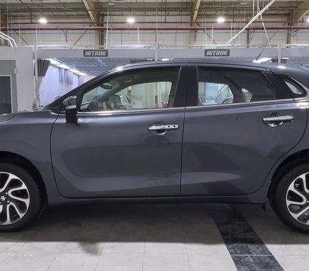 Gray Suzuki Baleno GLX 2024
