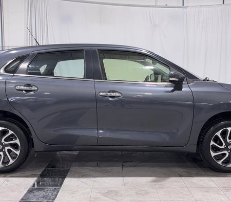 Gray Suzuki Baleno GLX 2024