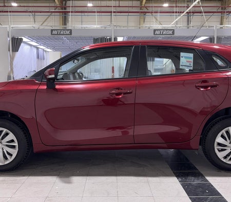 Red Suzuki Baleno GL 2024