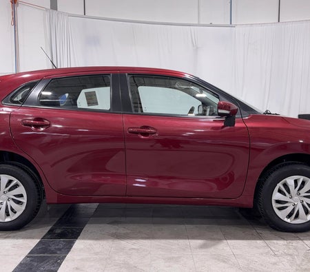 Red Suzuki Baleno GL 2024