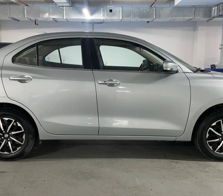 Silver Suzuki Dzire GLX 2026
