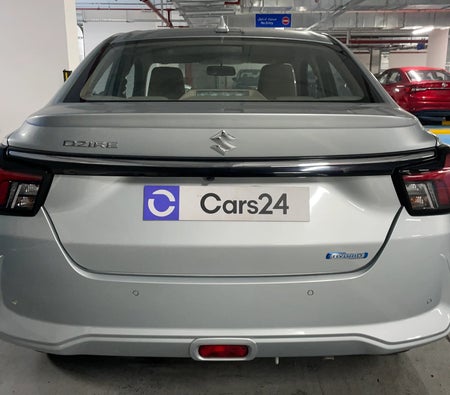 Silver Suzuki Dzire GLX 2026