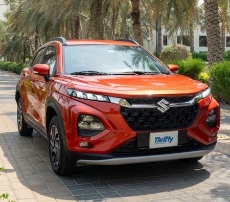 Orange Suzuki Fronx 2025