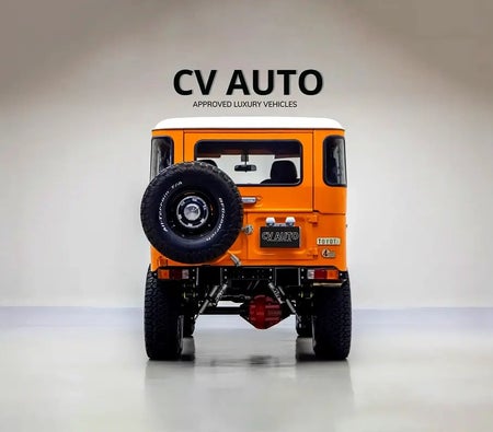 Orange Toyota Land Cruiser 1983