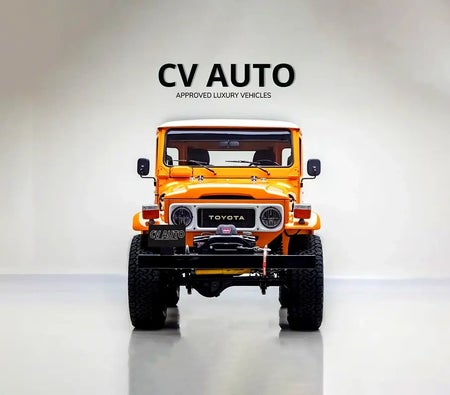 Orange Toyota Land Cruiser 1983