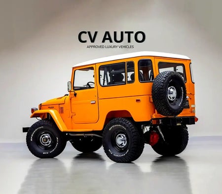 Orange Toyota Land Cruiser 1983