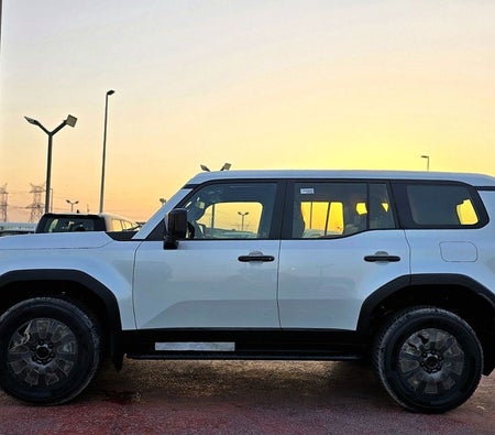 White Toyota Prado 2025