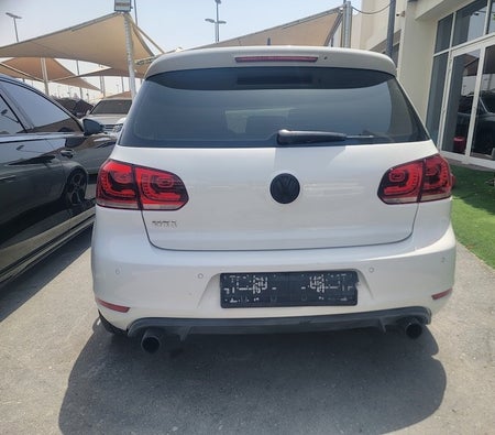White Volkswagen Golf GTI 2012