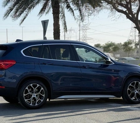 Blue BMW X1 2021