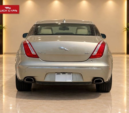 Gold Jaguar XJ 2014