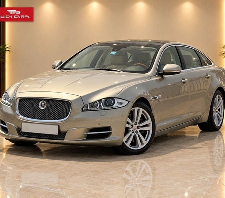 Gold Jaguar XJ 2014