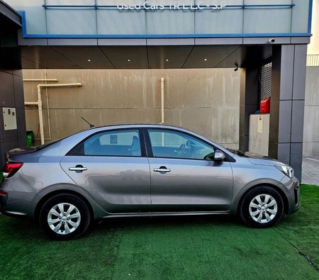 Gray Kia Pegas 2023