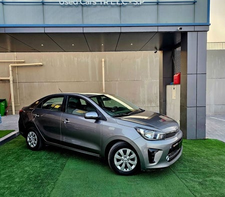 Gray Kia Pegas 2023