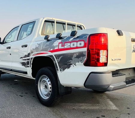 White Mitsubishi L200 2026