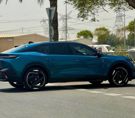 Blue Peugeot 408 2024