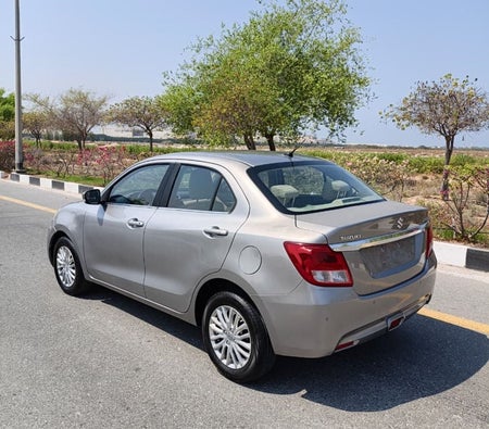 Silver Suzuki Dzire 2023
