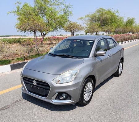 Silver Suzuki Dzire 2023