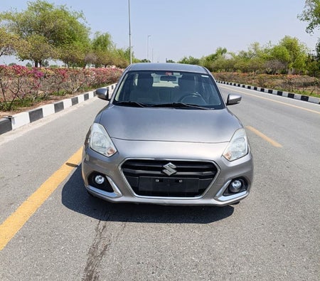Silver Suzuki Dzire 2023