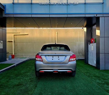 Silver Suzuki Dzire 2023