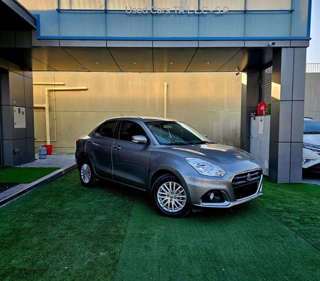 Silver Suzuki Dzire 2023
