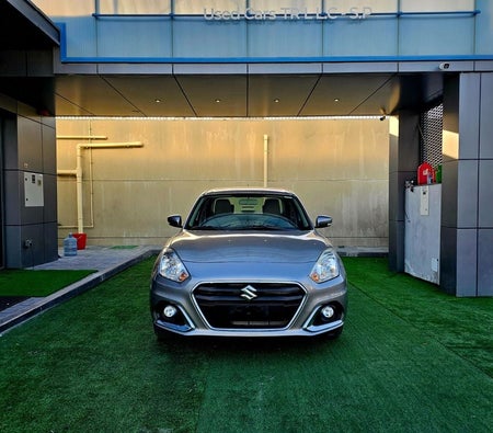 Silver Suzuki Dzire 2023