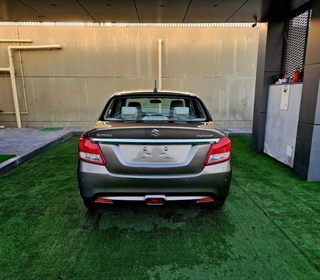 Gray Suzuki Dzire 2023