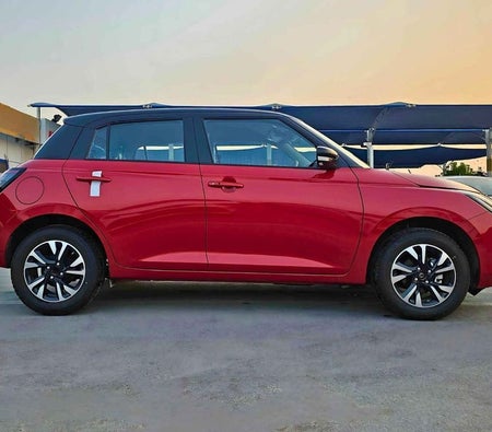 Rouge Suzuki Swift 2025